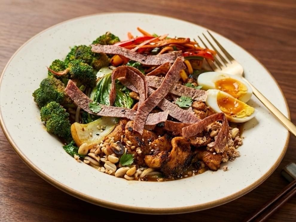 Burmese khow suey noodle bowl with chicken and egg