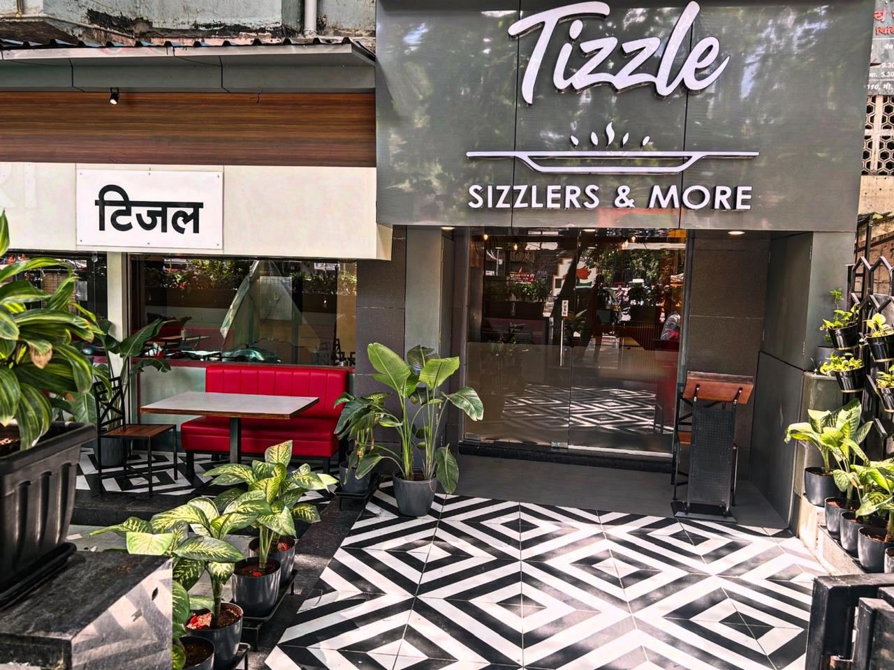 Tizzle storefront on Karve Road